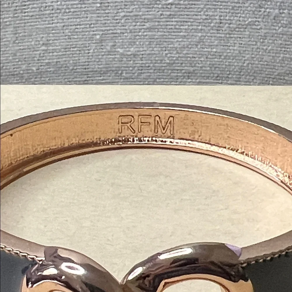 RFM stamped grey and rose gold hinge bracelet